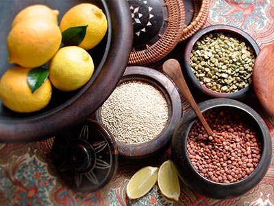Traditional ayurvedic ingredients in preparation bowls